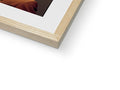 A soft cover picture of a book sitting on top of a small frame on a table