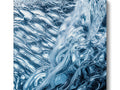 Art print of a water scene with waves in a pool of blue.
