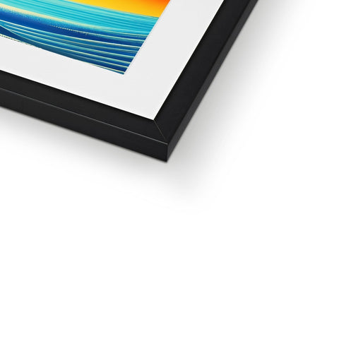 an abstract picture of colors with a picture frame on a table