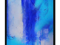 A large blue glass painting on a wall is hanging next to a piece of art on
