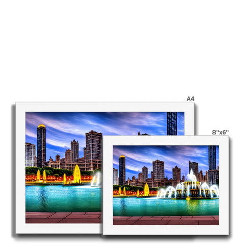 A colorful print with a cityscape and two photographs on a sheet of paper.