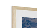 A picture of a blue and black photo hanging on a wood object