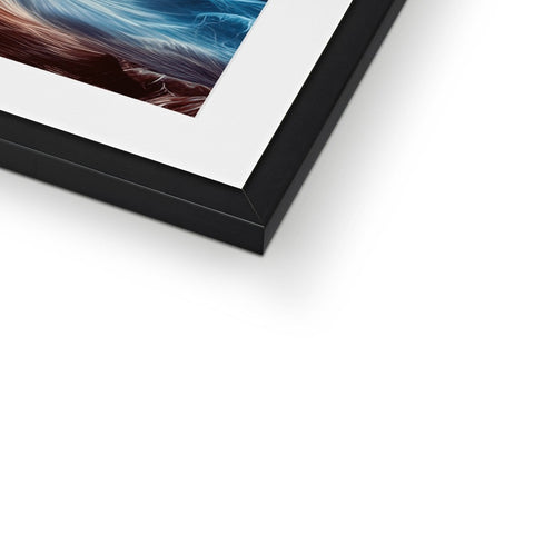 A framed picture of a beautiful sunset with a white background inside the frame.