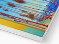A colorful print of a surf board on a card board.