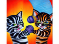 a two kittens looking up at a cross stitch print on a picture on a wall by
