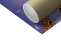 There is a giraffe on top of a toliet paper roll laying near the