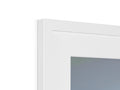 A small glass window frame set against a white wall with a picture frame.