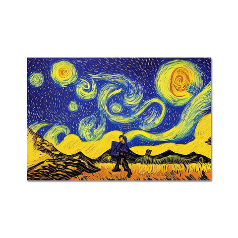 Some artwork on a blanket in a field with a sky of land on the horizon.