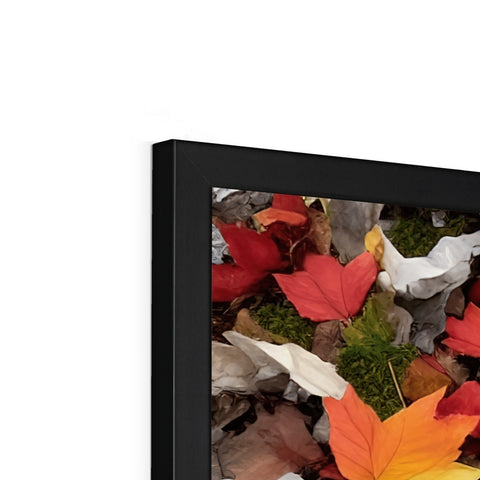 A picture frame with two flat screen televisions on it and a picture of scenery on