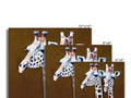 Five giraffe standing behind wooden boards on top of a wall