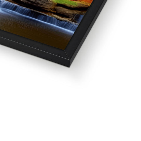 A picture frame with a phone with a photograph on it sitting on top of a black