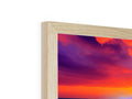 Photo of picture frame that has large wood frame with a picture of the sun sitting in