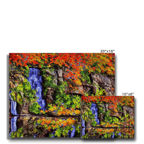 A colorful floral placemats are on a rock wall.