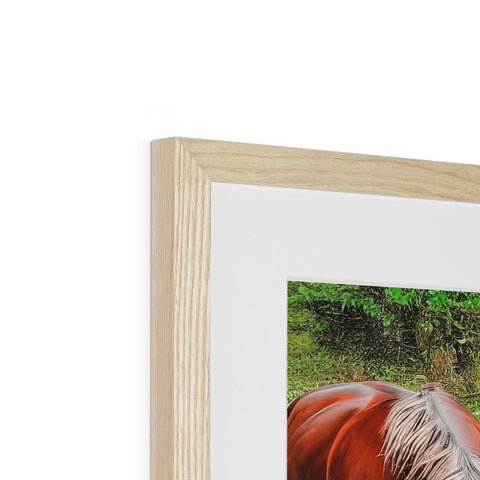A photo of a horse on a picture frame of a forest.