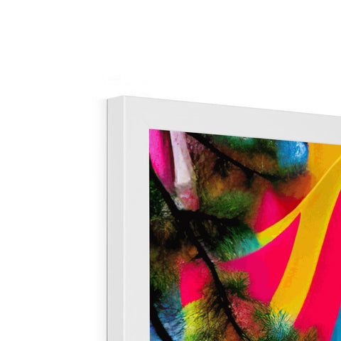 A colorful abstract painting of a green screen displayed next to a white book.