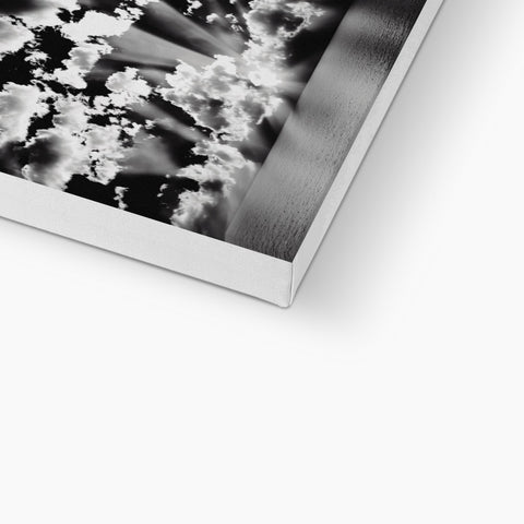 A silver tray with a flat panel sitting on top of an art print.