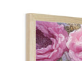a wood woodframe with a picture is filled with pink peonies sitting on top of