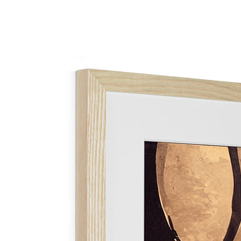 a photo frame of wooden furniture topped with a gold frame that has a piece of art