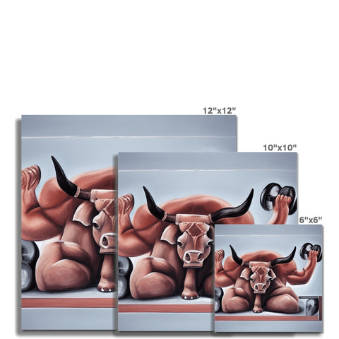 A pair of bulls standing on a wall with a ceramic tile picture of a bull on