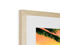 A wooden frame with art print with wood on it and a wooden photo of the ocean