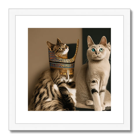 Cats sitting close together in a glass vase next to a picture of pharaoh