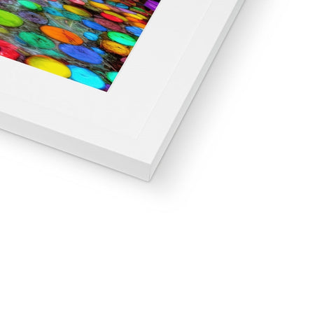 View of a picture of a colorful frame on a coffee table.