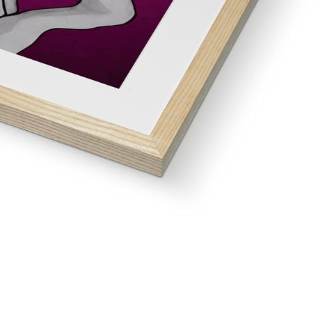 A photo of a figure with her teeth shown in the corner of an art print.