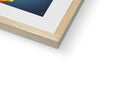 a large picture frame attached to a book with an apple sitting under the photo frame