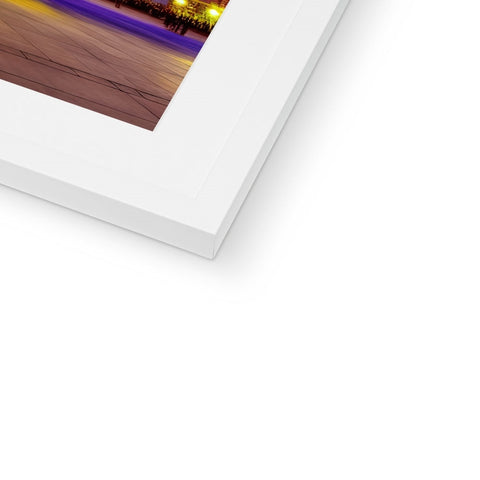 a single white photo of a framed photograph inside a white picture frame