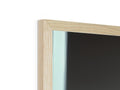 A picture frame holding a window and a piece of wooden wall in it.