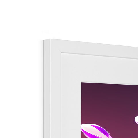An image of an imac portrait in a picture frame on a dark frame next to