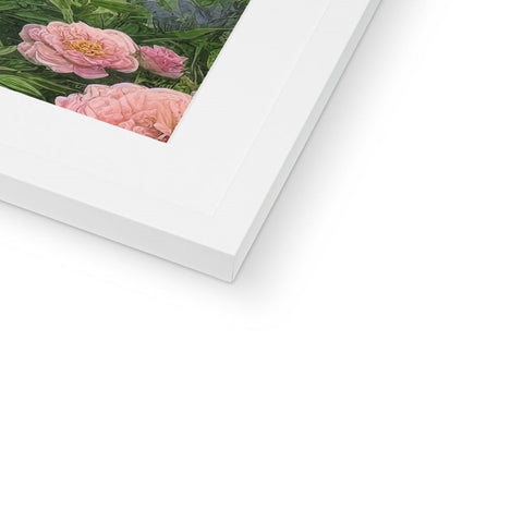 A picture of peonies on a white picture frame on a wall