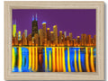 An art print of Chicago skyline on a picture frame.