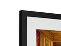 A frame contains a photograph hanging on it's side next to a gold frame.