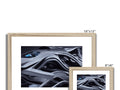 A blue and white framed picture of a picture with three different images at various angles and