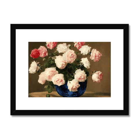 Potted roses are next to an art print with a photograph in a wall.