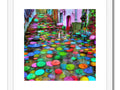 an art print that is on a floor filled with multicolored umbrellas on