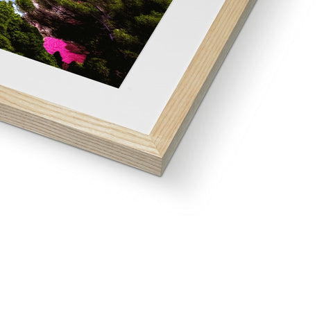 A soft cover picture of a picture frame in a frame with wooden frames.