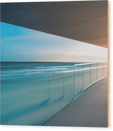 A picture of some glass in front of a room of a beach with some wooden walls