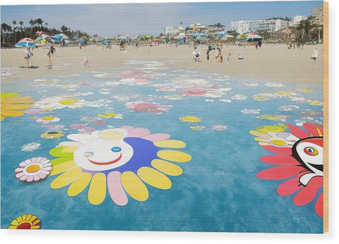 Smile photo of a colorful rug that is printed with blue flowers on it