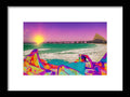 A view of the ocean and a colorful photograph that is framed out with a rock out
