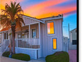 A sunset set in front of a building with one bedroom and two bedrooms