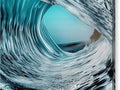 An ocean wave with a blue boogie board and a white surfboard