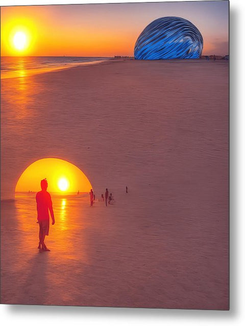 A very colorful sunset picture of a big blue blue balloon on a beach