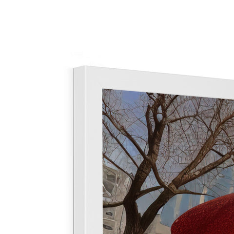 There is a photo of a red scarf on a photo frame that has a red coat