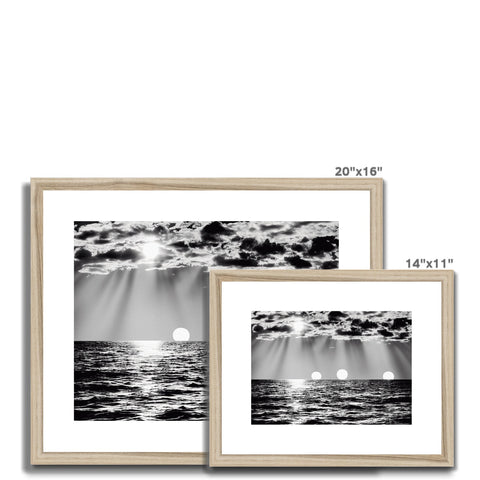 A black and white photograph frames are made of a view of an old ocean scene.