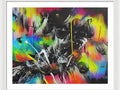 A spray painted art print that has been covered with a bright design.