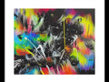An attractive white art print that is sprayed with graffiti spray on it.