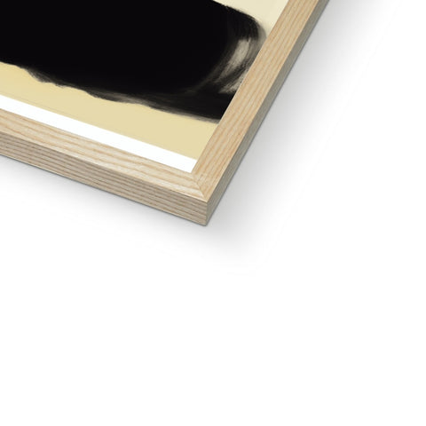 A picture of a black paperback book sitting on a piece of wood.