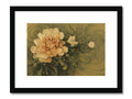 A white floral print framed artwork of a flower on a wall attached to a gold border